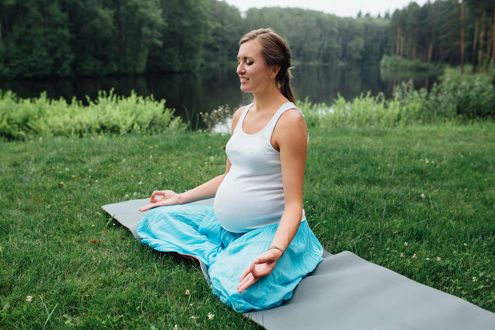 Pregnant women doing yoga