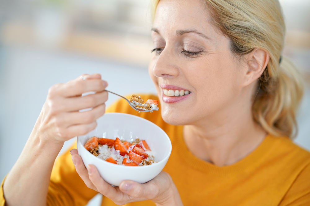Woman eating healthy food